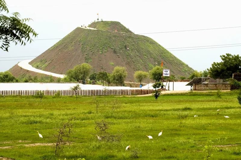 Dam construction for rainwater collection at Om Ashram
