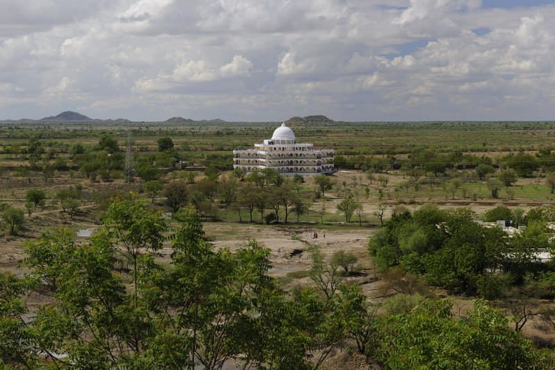 Sri Swami Madhavananda Hospital exterior view from distance